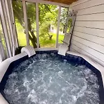 Σπίτι διακοπών Maison Charmante Avec Jacuzzi Et Cours D'eau